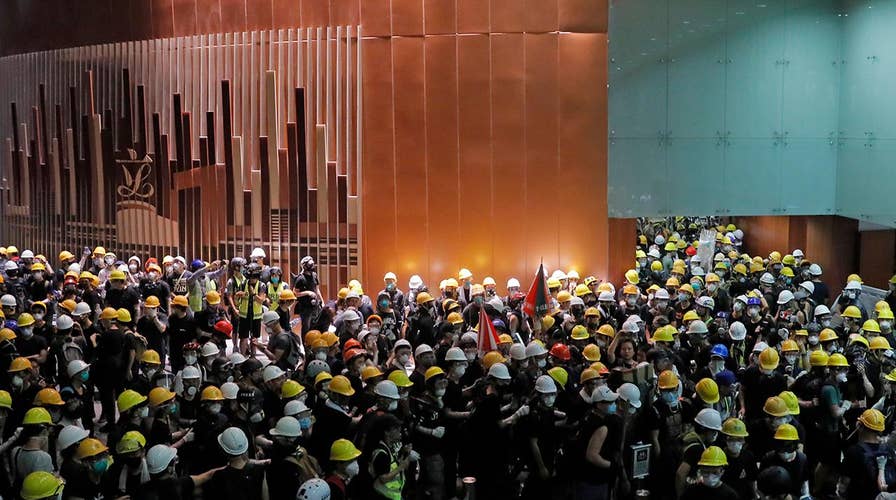 Hong Kong police investigating crime scene after protesters ransack parliament building