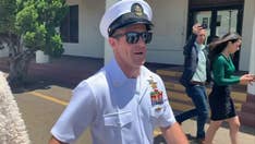 Navy upholds sentence reducing rank of Navy SEAL Eddie Gallagher for posing with corpse