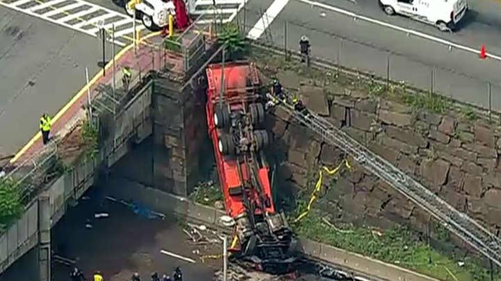 Truck plunges off overpass outside busy Lincoln Tunnel in New Jersey