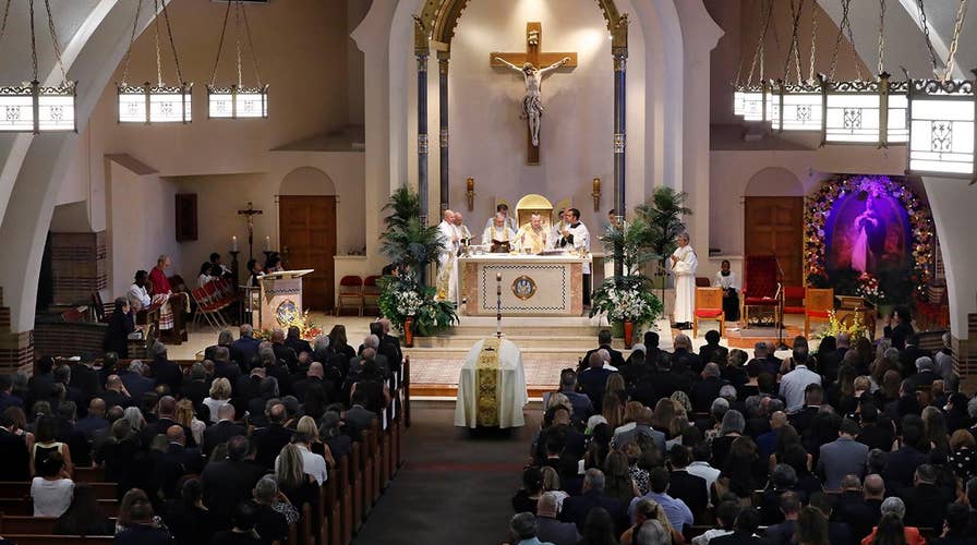 Thousands mourn as 9/11 first responder is laid to rest