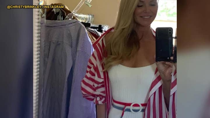 Christie Brinkley shows off svelte figure in American flag-inspired bathing suit