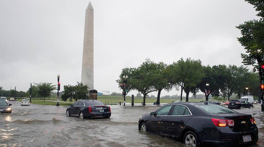 Torrential rains hit Washington DC, flooding streets, metro and White House basement