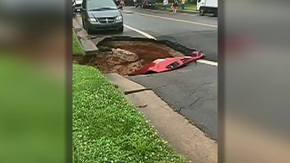 Giant Sinkhole In Virginia Swallows Mangles Parked Car