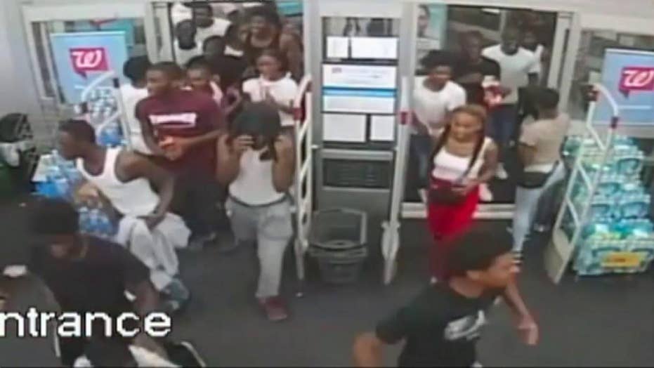 Dramatic video shows dozens looting Philadelphia Walgreens, police say