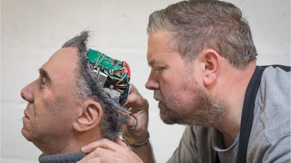 Image result for Humans will eventually merge with machines, professor says