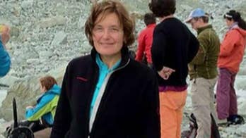 Greek coroner says dead woman believed to be American scientist was victim of 'criminal act'