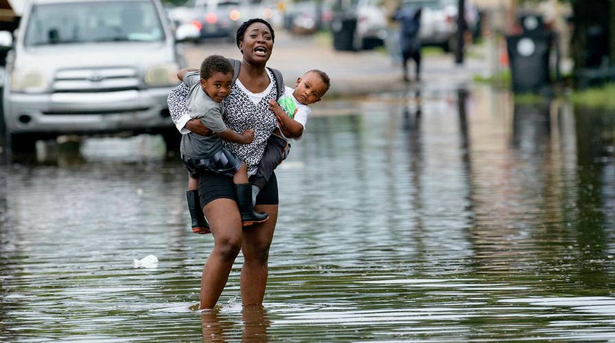 New Orleans bracing for prospect of a foot of rain as a Gulf system grows stronger