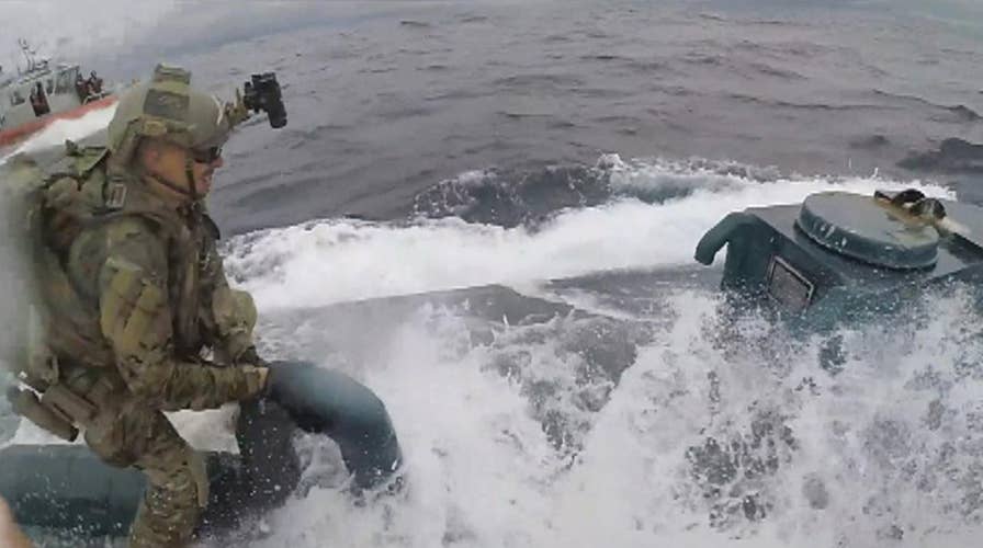 US Coast Guard storms submarine carrying thousands of pounds of drugs