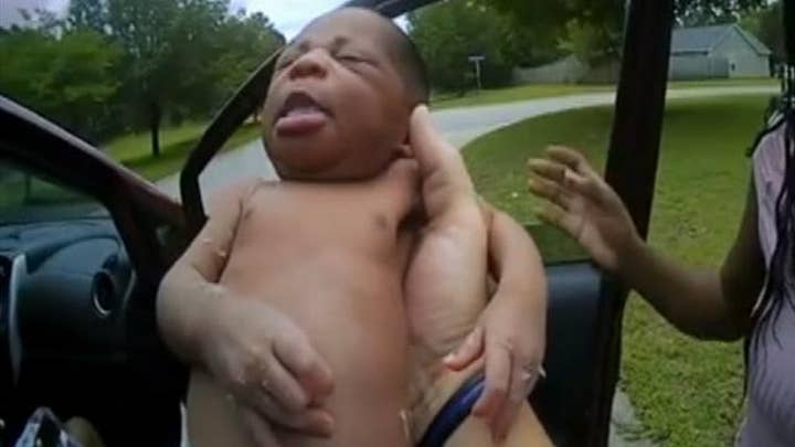 Cop performs life-saving first aid to 12-day-old baby after stopping a vehicle for speeding