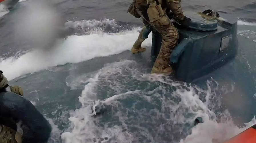 Watch: Coast Guard sailors leap onto moving drug smuggling sub