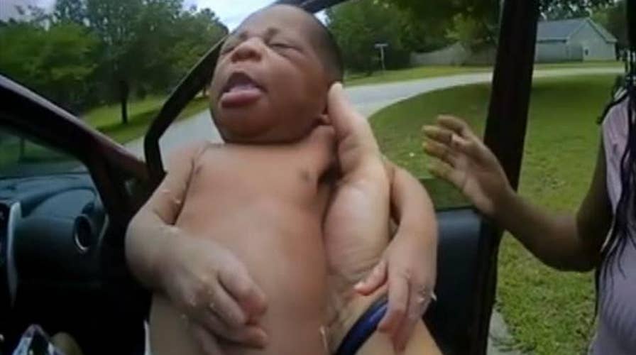 Cop performs life-saving first aid to 12-day-old baby after stopping a vehicle for speeding
