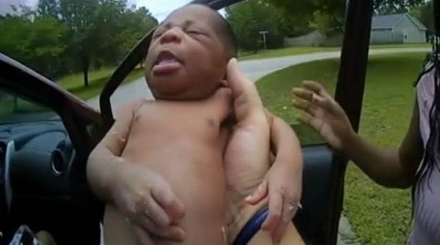 Cop performs life-saving first aid to 12-day-old baby after stopping a vehicle for speeding