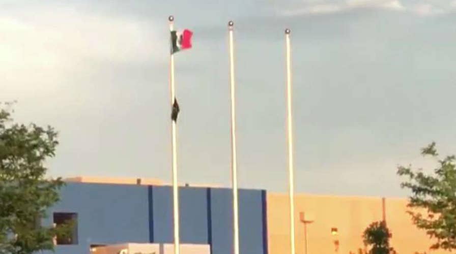 Protesters raise Mexican flag at Colorado ICE facility