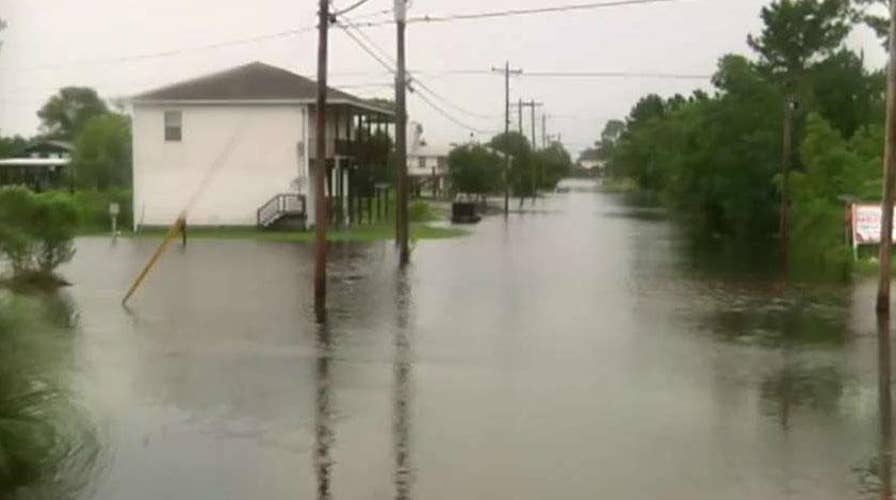 Barry upgraded to Category 1 hurricane