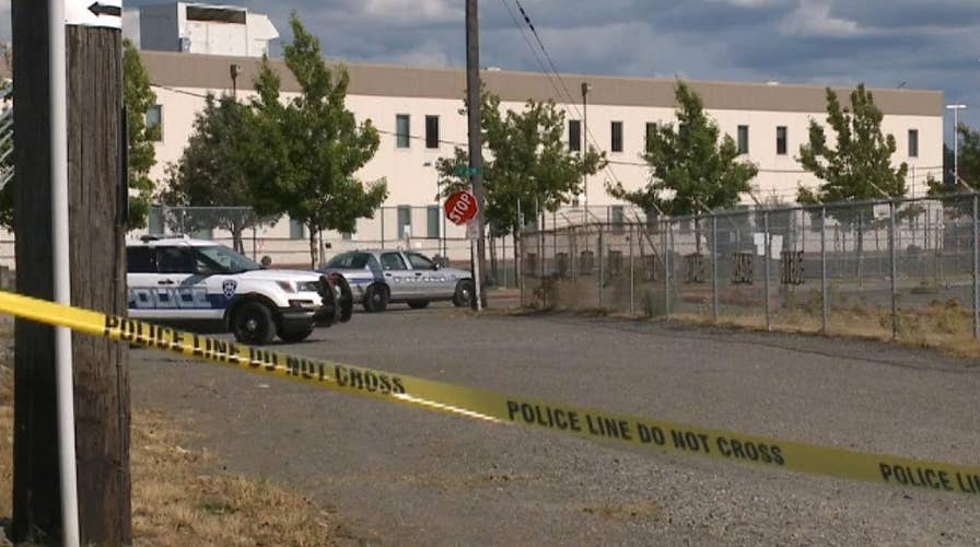Man armed with rifle, fire bombs attacking ICE detention center fatally shot by police