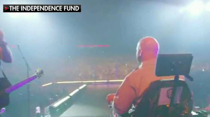 Jennifer Griffin joins Florida Georgia Line onstage to present injured veteran with track chair