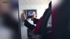 Video of airline passenger using feet to operate in-flight screen horrifies Twitter: 'I would open a side door and jump out'