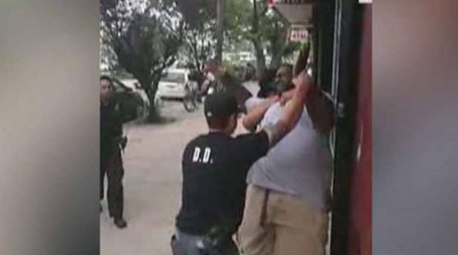 Family members, demonstrators protest decision not to press federal charges in Eric Garner case