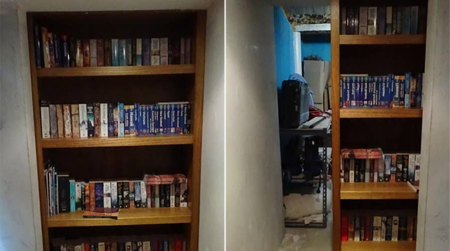 Bookshelf in suburban Australian home hides secret door to gang's high-tech drug lab