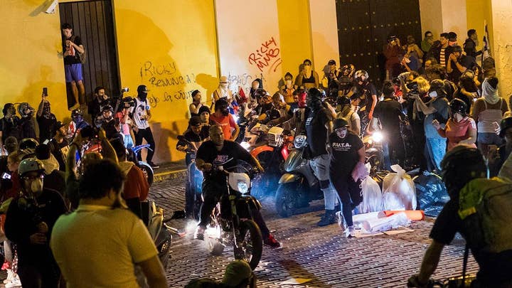 San Juan in cleanup mode after thousands pack streets to protest governor