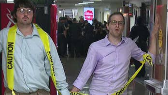 Environmental protesters arrested after gluing themselves to tunnels under Capitol