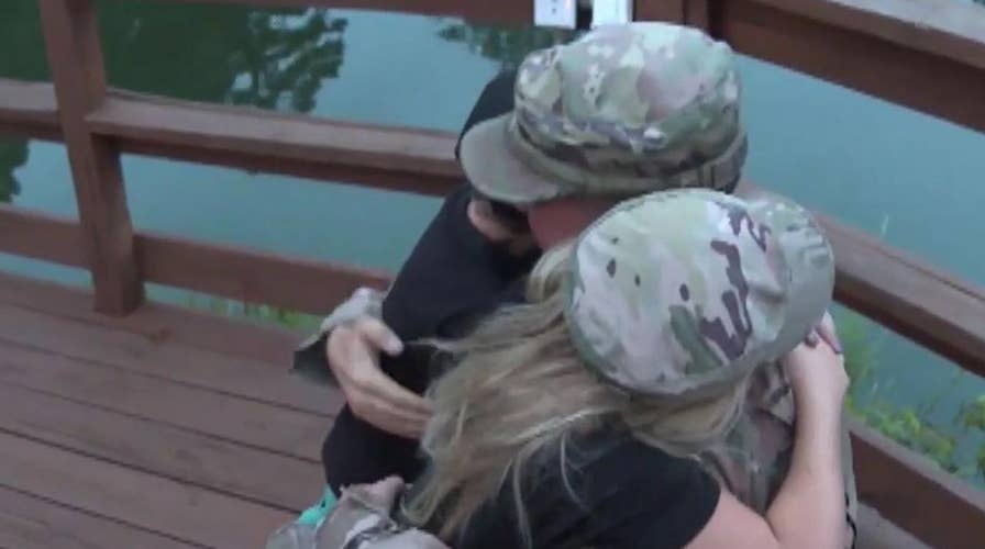 Military dad surprises his kids at summer camp bonfire