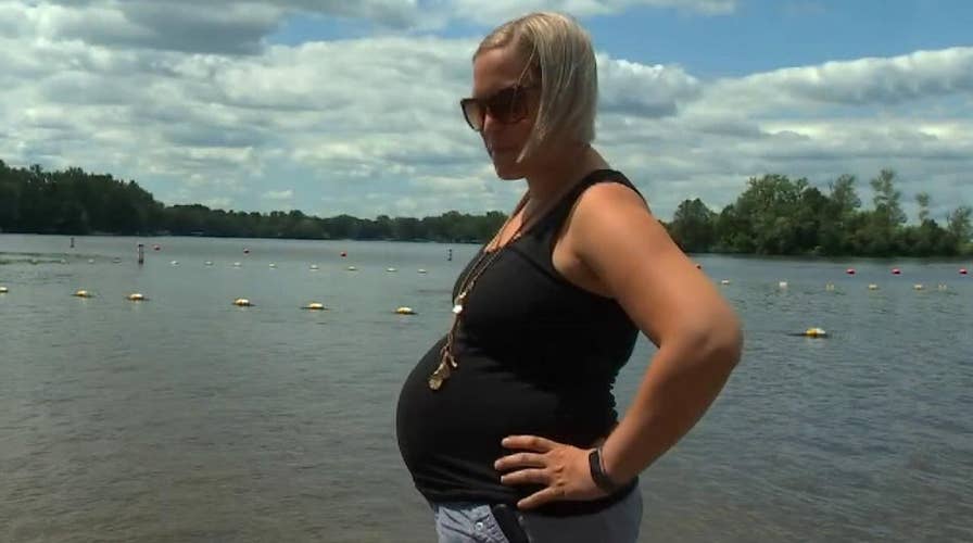 Pregnant former lifeguard rescues drowning boy from lake near Minneapolis