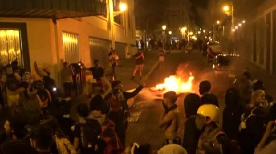 Police flank governor's mansion in Puerto Rico after night of violent protests