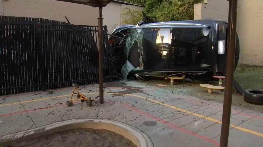 Driver survives crashing his Tesla off cliff into daycare playground