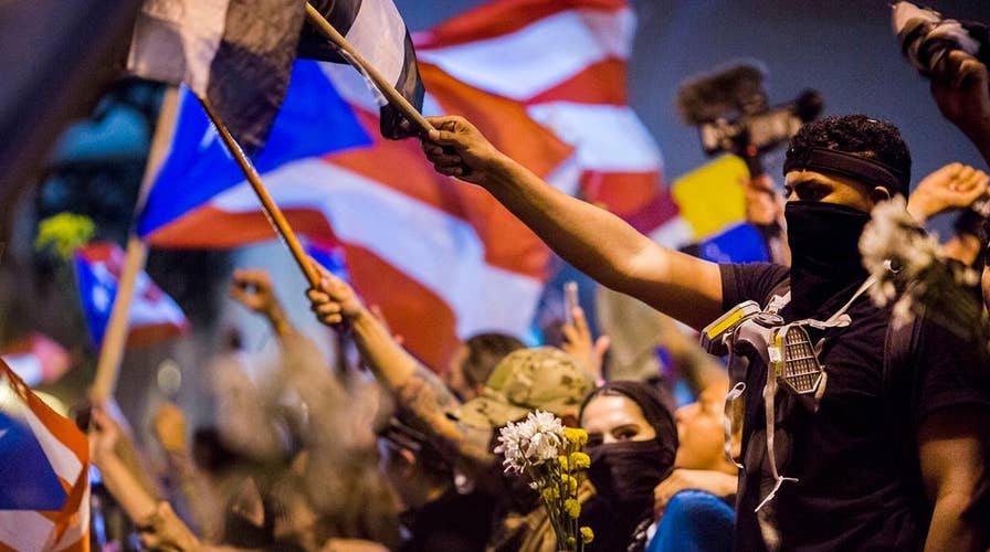 Celebrations spill into streets of San Juan as Puerto Rico governor resigns