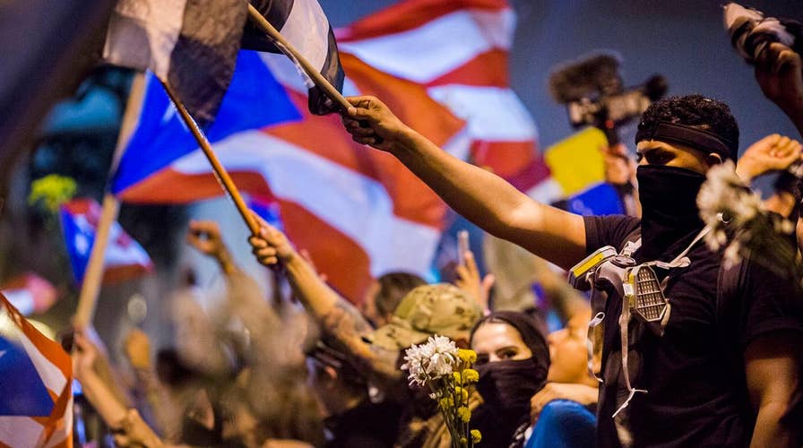 Celebrations spill into streets of San Juan as Puerto Rico governor resigns