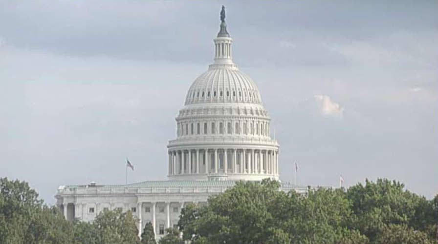 House approves budget and debt limit deal