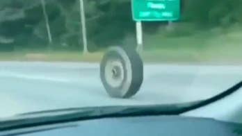 Runaway tire on New Jersey freeway crashes into vehicle: video