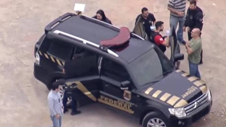 Armed men raid Sao Paulo airport and flee with $30 million in gold