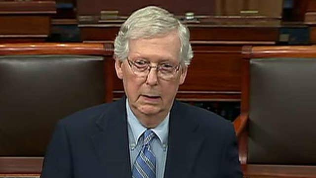 Senate Majority Leader Mitch McConnell defends himself from criticism for blocking election security bills