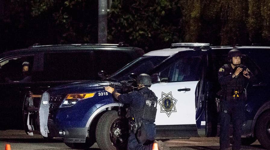 Gilroy shooter described as wearing fatigues, armed with machine gun