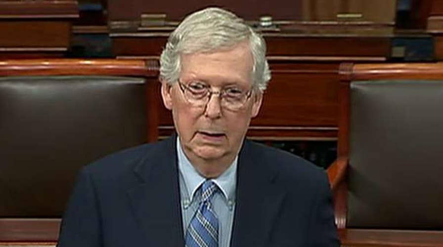 Senate Majority Leader Mitch McConnell defends himself from criticism for blocking election security bills