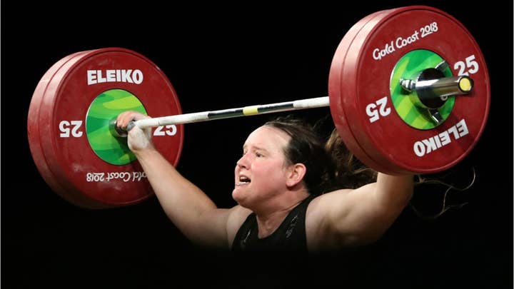 Transgender weightlifter’s gold medal sparks new debate