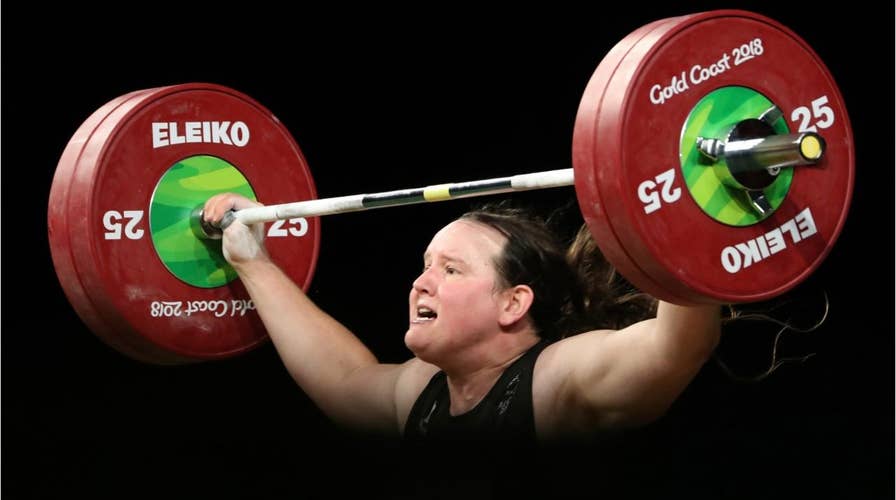 Transgender weightlifter’s gold medal sparks new debate