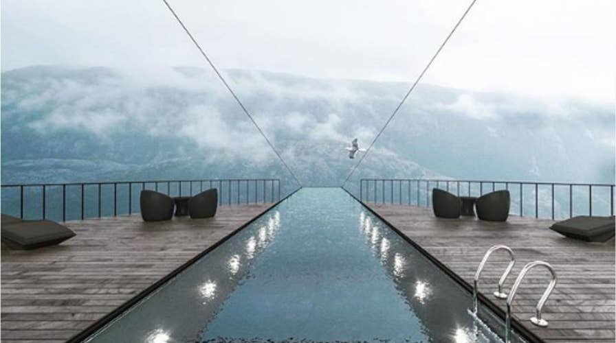 Architecture firm shares concept for boutique hotel partially hanging from 1,982-foot cliff in Norway