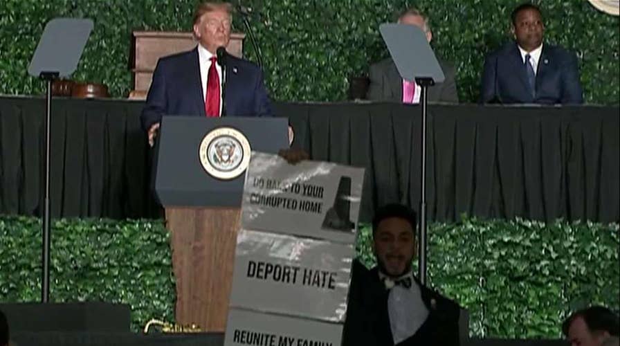 Protester interrupts President Trump's speech at Jamestown anniversary event