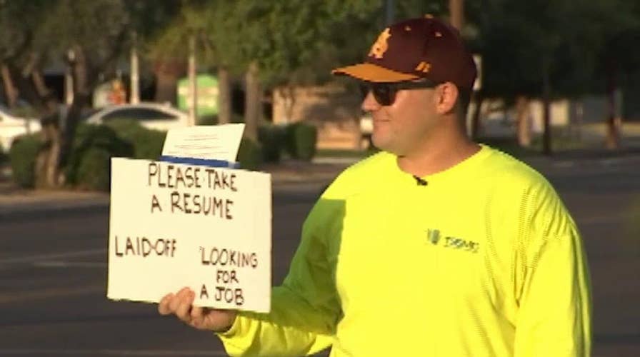 Phoenix panhandler hands out resumes at intersections