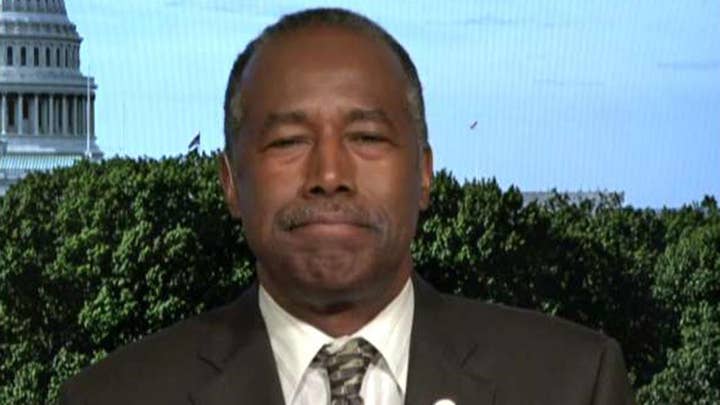 Ben Carson visits Baltimore amid uproar over Trump's remarks about the city