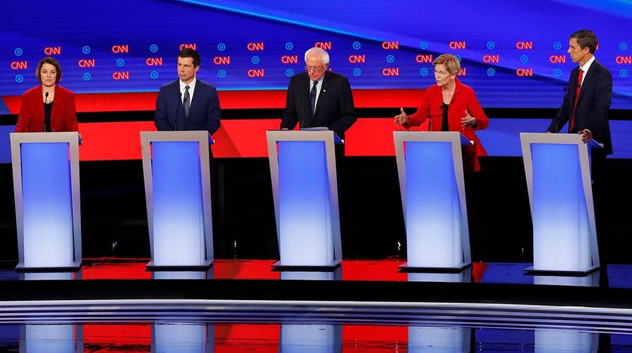 Moderate and progressive candidates clash on debate stage for soul of Democratic Party