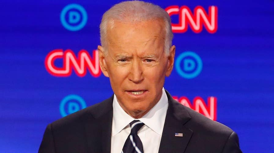 2020 Democrats pile on Joe Biden's record, ties to Obama on debate stage