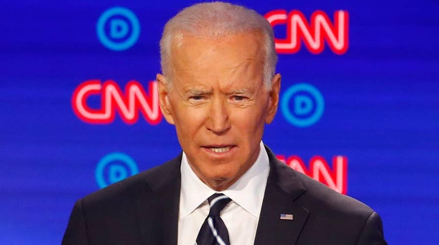 2020 Democrats pile on Joe Biden's record, ties to Obama on debate stage