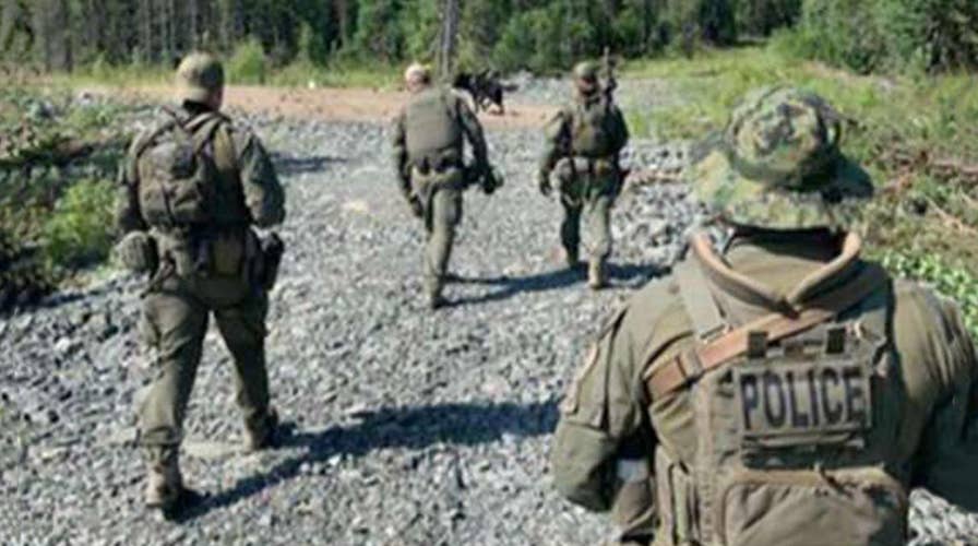 Canadian police to scale back manhunt for two teens suspected in killings of American woman, two others