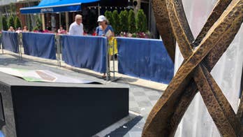 Memorial to Boston Marathon bombing victims rises