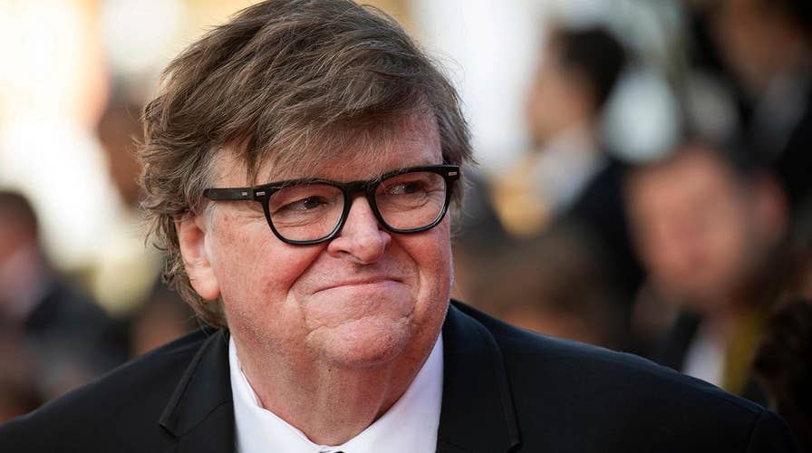 Michael Moore urges Michelle Obama to run for president