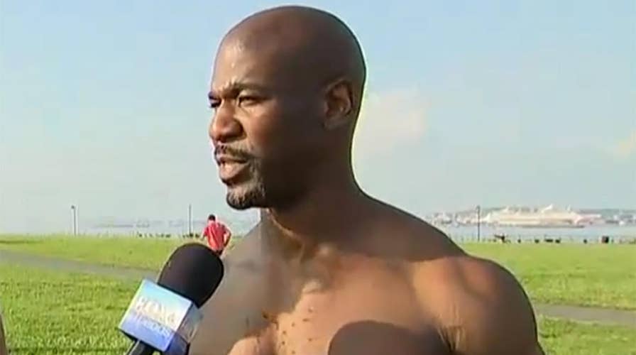 Navy SEALS prepare to swim across the Hudson River to honor veterans